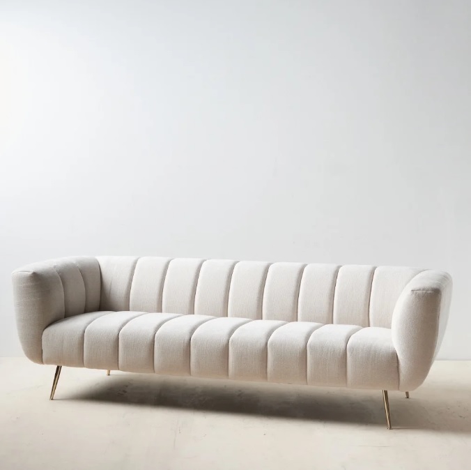 121868 Sofá de diseño Art Decó 226 tela beige y patas altas metal dorado