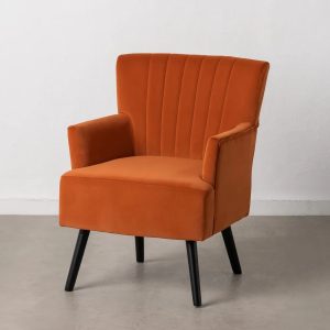 Sillón de diseño vintage tapizado terciopelo naranja con costuras patas de madera color negro