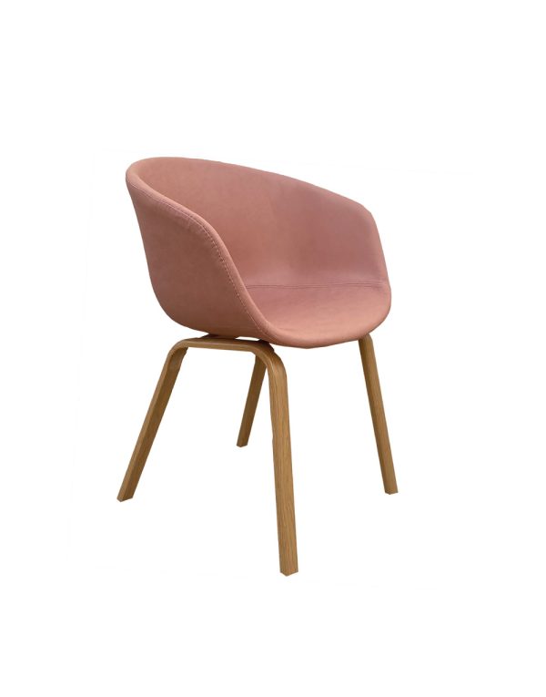 Sillón de diseño nórdico patas forma U imitación madera y asiento polipiel rosa