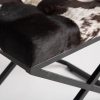 Pie de cama de diseño vintage TRIM 53 cuero blanco y negro con patas cruzadas en hierro color negro 3
