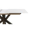 Mesa de comedor extensible diseño moderno porcelánico efecto mármol y patas metal cobre