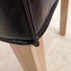Silla de diseño clásico vintage CAMPBELL tapizado capitoné en piel color negro con patas de madera 3