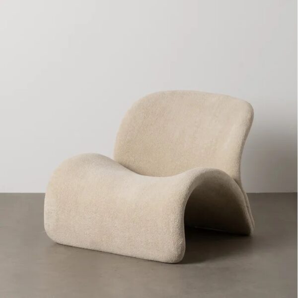 613645 Sillón butaca de diseño moderno formas ondulas tapizado beige