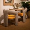946018 Sillón de diseño moderno NOVA formas curvas y tapizado pata de gallo con terciopelo amarillo