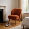 615283 Sillón butaca diseño moderno patas de madera y tapizado bouclé terracota
