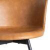 615512 Silla de diseño industrial formas redondeadas simil piel camel y patas metal negro