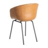 615518 Silla de diseño industrial formas redondeadas simil piel camel y patas metal negro