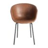 615519 Silla de diseño industrial formas redondeadas simil piel marrón y patas metal negro
