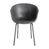 615520 Silla de diseño industrial formas redondeadas simil piel negro grisáceo y patas metal negro